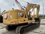 2018 Caterpillar 320 excavator, rear three-quarter view