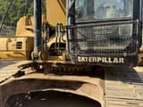 2006 Caterpillar 325CL crawler excavator cab and tracks view