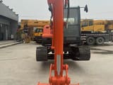 2018 Doosan DX60 crawler excavator, front view of boom and bucket