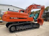 2024 Doosan DX225LC crawler excavator, side view