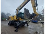 2007 Caterpillar M316D wheel excavator, side view