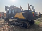2022 Volvo EC210 crawler excavator, rear three-quarter view