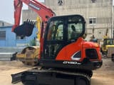 2023 Doosan DX60-9C mini excavator, side profile view