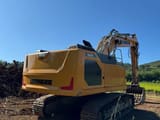 2024 Liebherr 926 excavator, rear three-quarter view