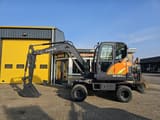 2024 Develon DX60WN ECO-1 wheel excavator side view