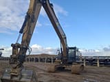 2013 Caterpillar 329E crawler excavator, front three-quarter view