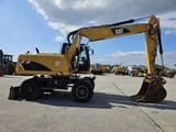 2014 Caterpillar M315D wheel excavator, side profile view