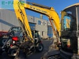 2012 New Holland E50 B SR mini excavator side view
