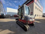 2017 Takeuchi TB250 mini excavator, rear three-quarter view