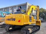 2023 Komatsu PC220 crawler excavator rear three-quarter view