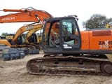 2012 Hitachi Zaxis 210LC crawler excavator side view