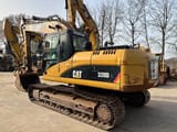 Escavatore cingolato Caterpillar 320DL del 2009, vista posteriore tre quarti