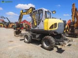 2014 Wacker Neuson EW100 wheel excavator, rear three-quarter view