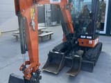 2024 Hitachi ZX26U-6 mini excavator, front three-quarter view