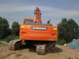 2022 Doosan DX225LC crawler excavator, rear view