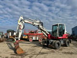 2018 Takeuchi TB295W wheel excavator, side profile view