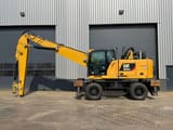 2019 Caterpillar MH3024 material handler, side view
