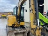 2022 Caterpillar 305E2 mini excavator, front three-quarter view