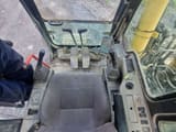 1999 Komatsu PC340.6 crawler excavator operator cab interior view