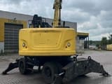 2015 Caterpillar 302.2 material handler, rear view