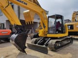 2022 Komatsu PC128US mini excavator, front three-quarter view