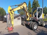 2013 Wacker Neuson 9503 wheel excavator, front three-quarter view