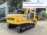 2024 Komatsu PC130 crawler excavator, rear three-quarter view