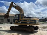 2020 Caterpillar 320B crawler excavator, rear three-quarter view