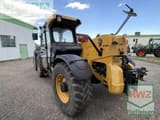2016 Caterpillar TH 407C telehandler rear three-quarter view