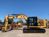 2016 Caterpillar 318F crawler excavator, side view