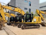 2021 Caterpillar 320GC crawler excavator, side view