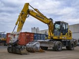 2018 Komatsu PW148-10 wheel excavator, front three-quarter view