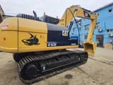 2016 Caterpillar 312D2 crawler excavator, rear three-quarter view