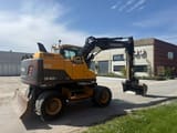2013 Volvo EW140D wheel excavator, rear three-quarter view