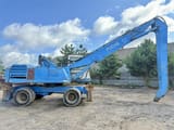 1999 Fuchs MHL340 material handler side view