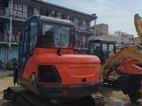 2016 Doosan DX60 crawler excavator, rear three-quarter view