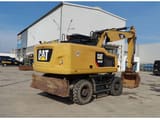 2016 Caterpillar M320F wheel excavator rear three-quarter view