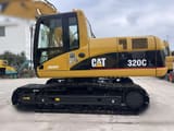 2012 Caterpillar 320CL paletli ekskavatör yandan görünüm