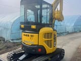 2023 Komatsu PC35 MR mini excavator, rear three-quarter view