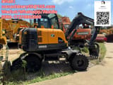 Hyundai HW60 wheel excavator, side view