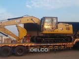 2026 Caterpillar 324 crawler excavator, side view