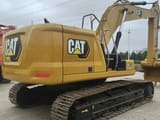 2023 Caterpillar 330 crawler excavator, rear three-quarter view