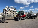 2024 Takeuchi TB395W wheeled excavator side view