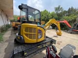 2022 Komatsu PC55MR-2 mini excavator, rear three-quarter view