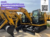 2026 Caterpillar 305.5 mini excavator, side profile view