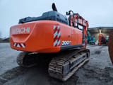 2019 Hitachi ZX300LCN-6 crawler excavator, rear three-quarter view