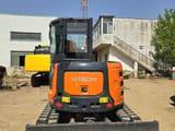 2023 Hitachi ZX55 mini excavator, rear view