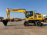 2019 Komatsu PW180-11 wheel excavator, side profile view
