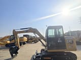 2024 Caterpillar 305.5 mini excavator, side view