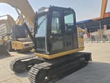2023 Caterpillar 308.5E2 mini excavator, side view